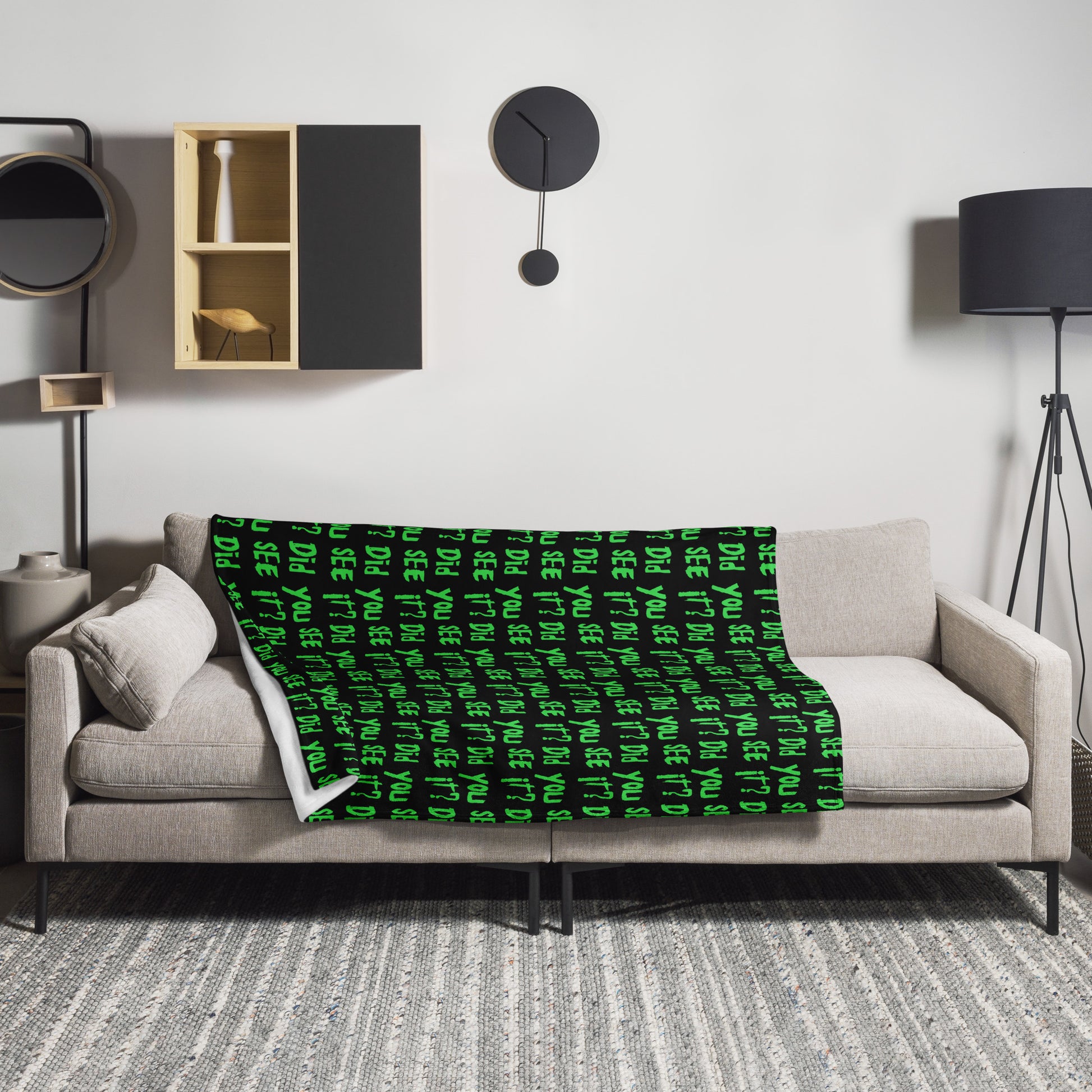 Nuke's Top 5 throw blanket on a couch with the phrase "Did You See It?" printed in green