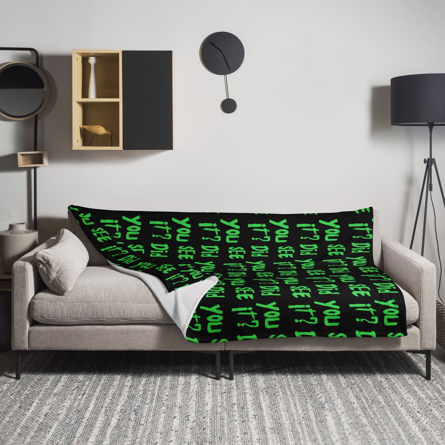 Nuke's Top 5 throw blanket on a couch with the phrase "Did You See It?" printed in green